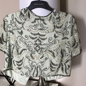 Embellished mint green top